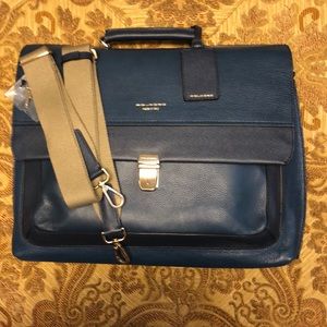 Piquadro briefcase with shoulder strap.